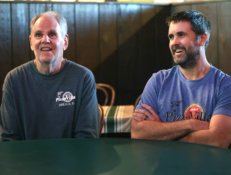 Joe Finn (left) and his son CJ, co-owners of Pizza Villa, laugh about a memory Monday, Jan. 26, 2026, at the restaurant as they talk about their longtime family-owned business on Lincoln Highway in DeKalb.