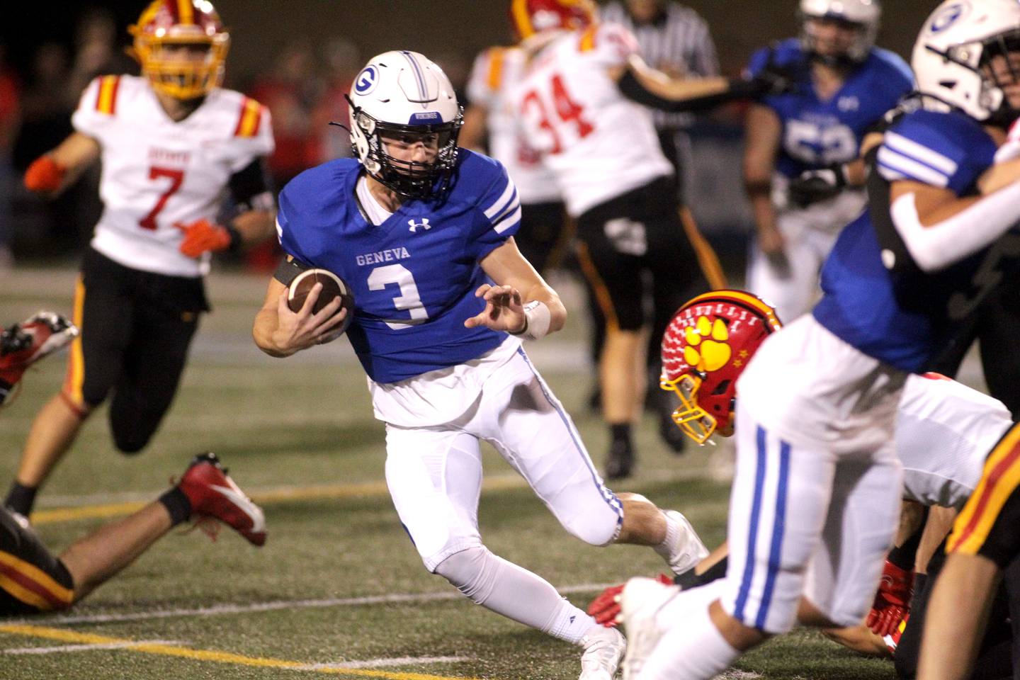 Geneva quarterback Nate Stempowski keeps the ball during a game against Batavia at Geneva on Friday, Sept. 29, 2023.