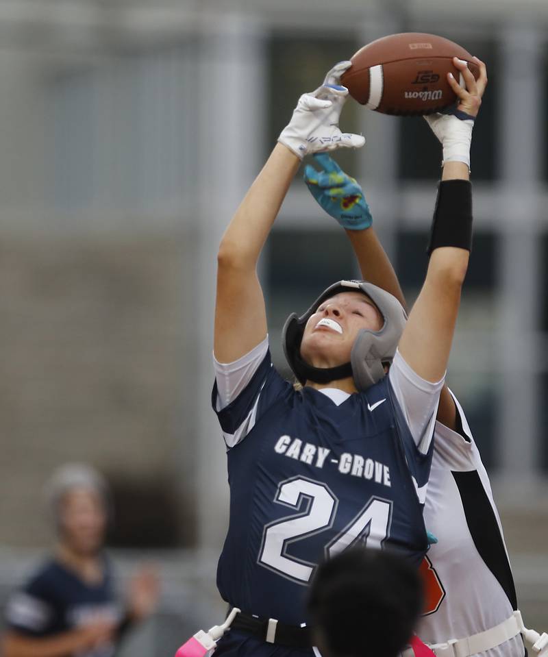 Cary-Grove's Aria Stanton catches a pass for a touchdown during an IHSA McHenry Sectional semifinal girls flag football game against Harlem on Monday, Oct. 13, 2025, at McCracken Field in McHenry.
