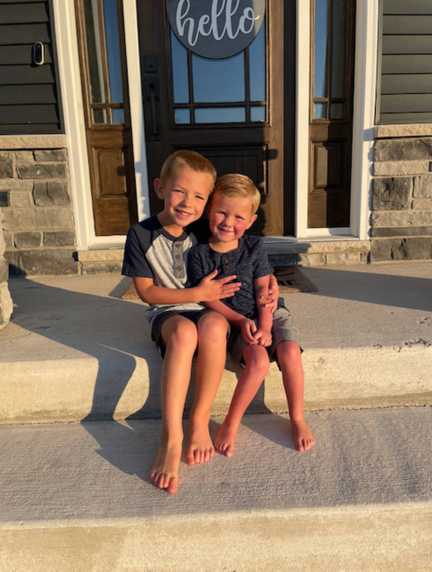 Noah, left, and Levi Olson of Marengo on the first day of school for Noah, Aug. 17, 2022. Levi is awaiting a heart transplant.