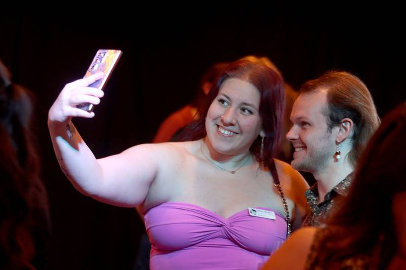 Kelsey Waughon, left, and Reede Norlie take a selfie during Shaw Media's Best of the Fox celebration at Lou’s Lounge at the Dole in Crystal Lake on Thursday, Sept. 18, 2025. Waughon and Norlie represented Theatre 121, which was recognized as One of the Best in the Watch Live Theater category.