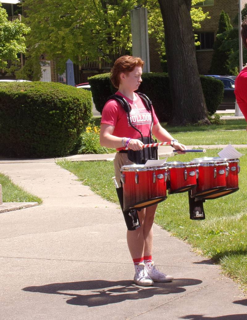 A Streator High School band member performs percussion for "The Battle Hymn of the Republic" on Monday, May 27, 2024, during at the Memorial Day ceremony in Veterans Memorial Plaza at City Park in Streator.
