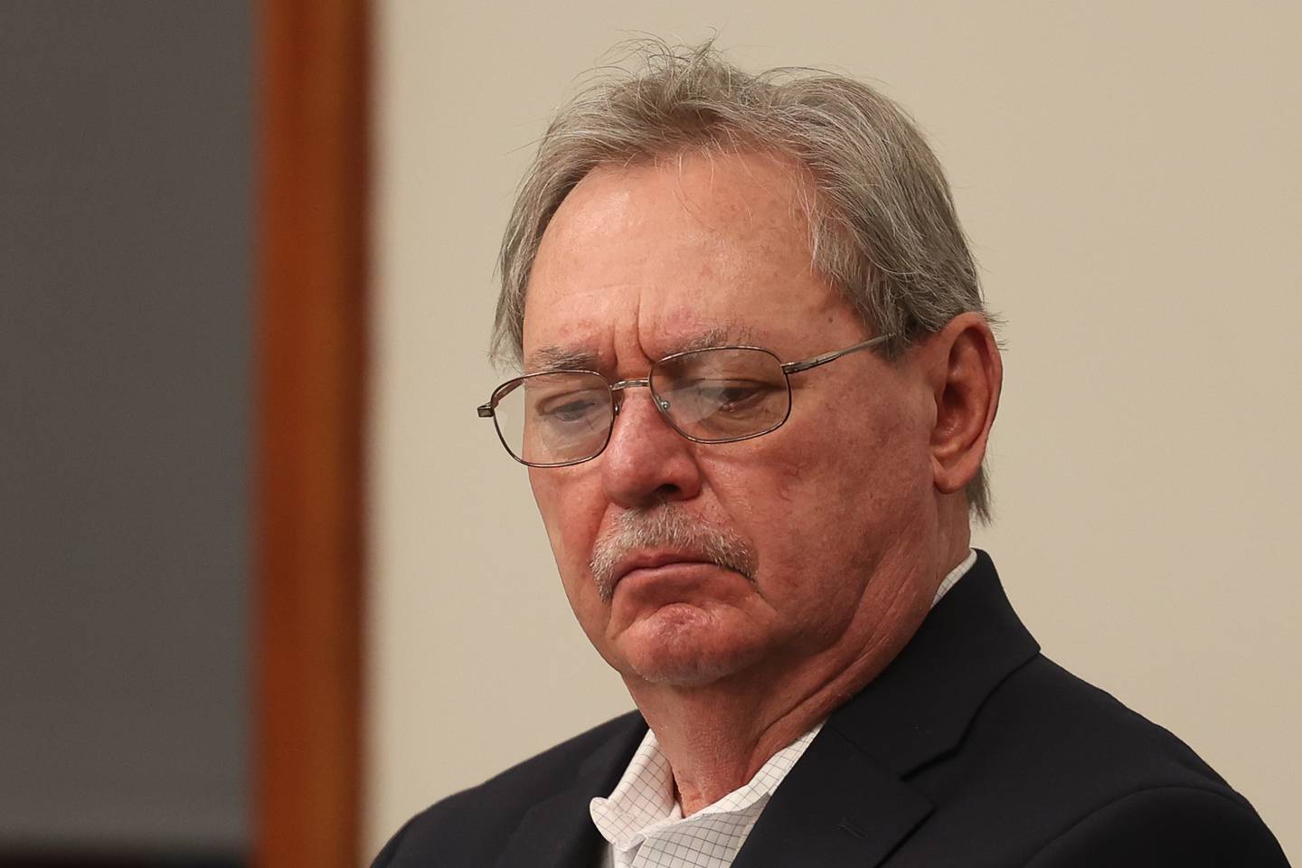 Candidate for Joliet City Council District 2 Robert Wunderlich listens to Pat Mudron answer a question at a forum for the candidates at the Joliet Public Library on Tuesday, March 14th, 2023 in Joliet.