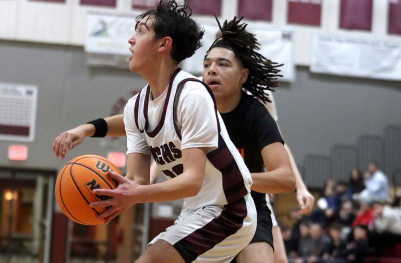 Marengo’s Myles Aukes heads for the net against Sandwich in varsity boys basketball action on Saturday, Jan..24, 2025, at Marengo High School in Marengo.