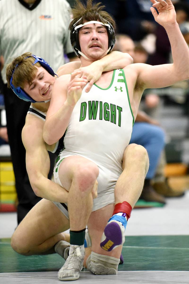 Central-Iroquois West's Gianni Panozzo, left, looks to finish a takedown of Dwight's Dylan Crouch during the 150-pound championship of the IHSA Class 1A Coal City Sectional Saturday, Feb. 15, 2025.