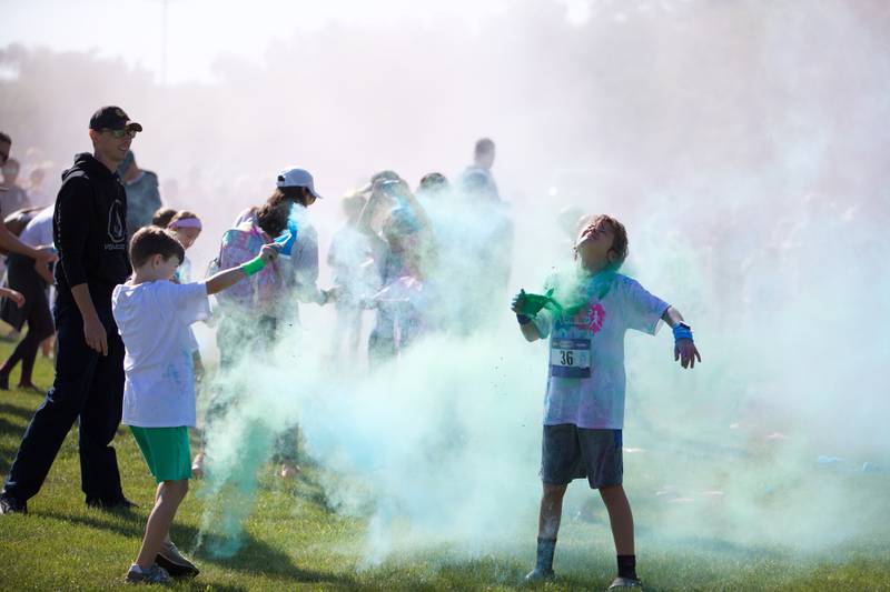 Kids get some color on  prior to the Glen Ellyn 2K Kids Color Bash Run on Saturday Aug.10, 2024 at Ackerman Park in Glen Ellyn.