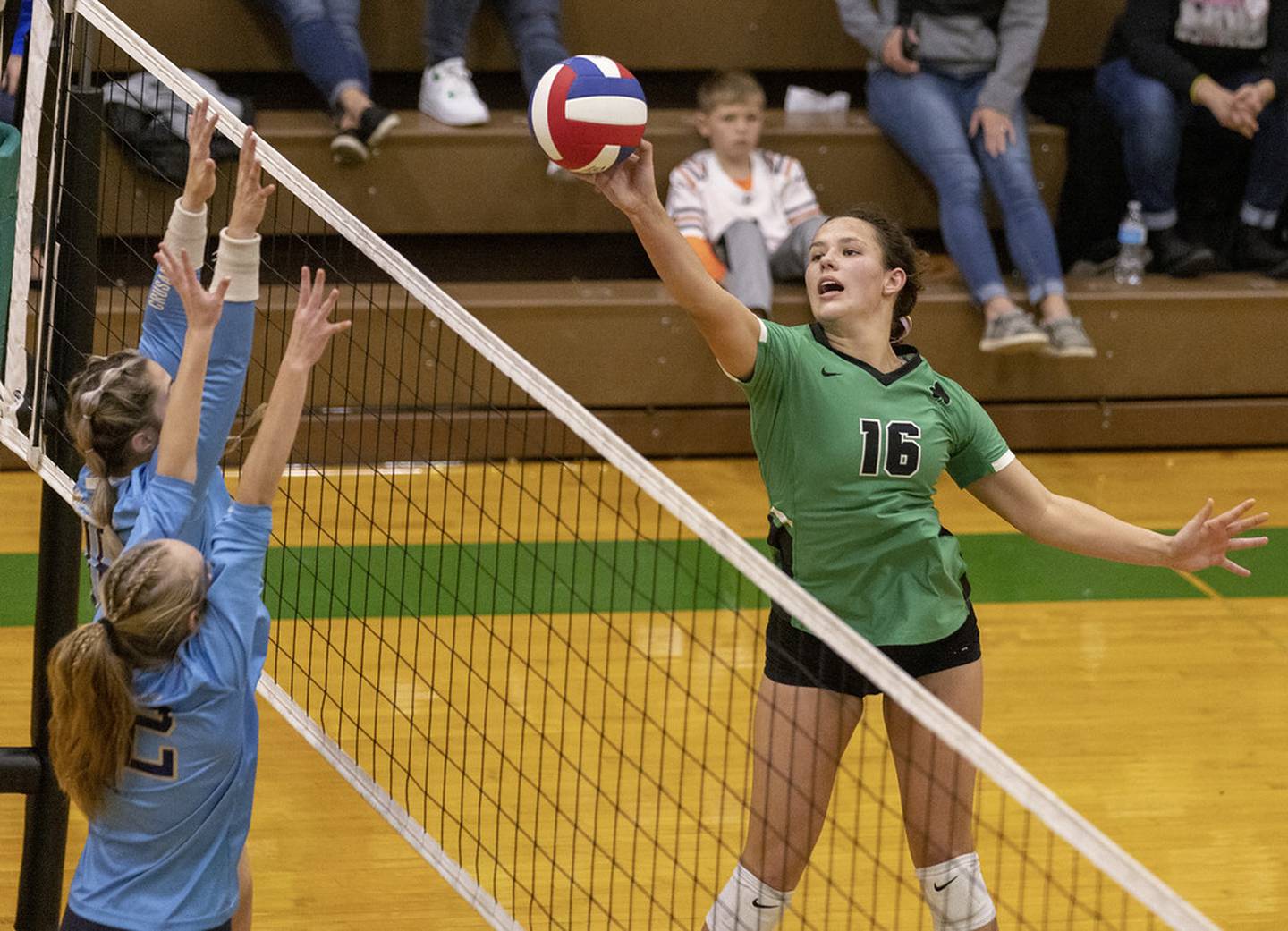Seneca's Faith Baker tips around the Marquette block in the Tri-County Tournament title game Thursday in Seneca.