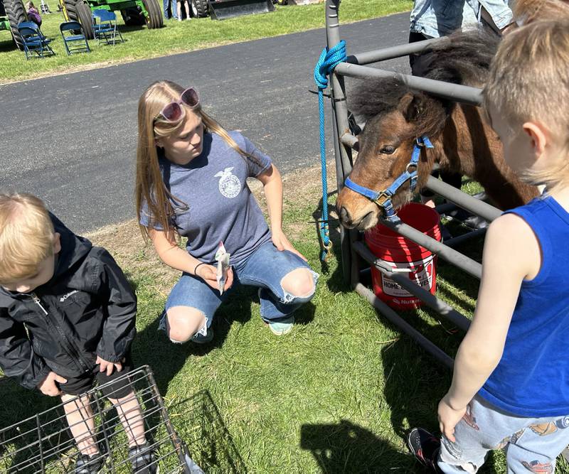 Oregon High School FFA student Cheyanne Edlund brought her miniature horses, Sierra and Hudson, to the FFA petting zoo on Friday, May 9, 2025.