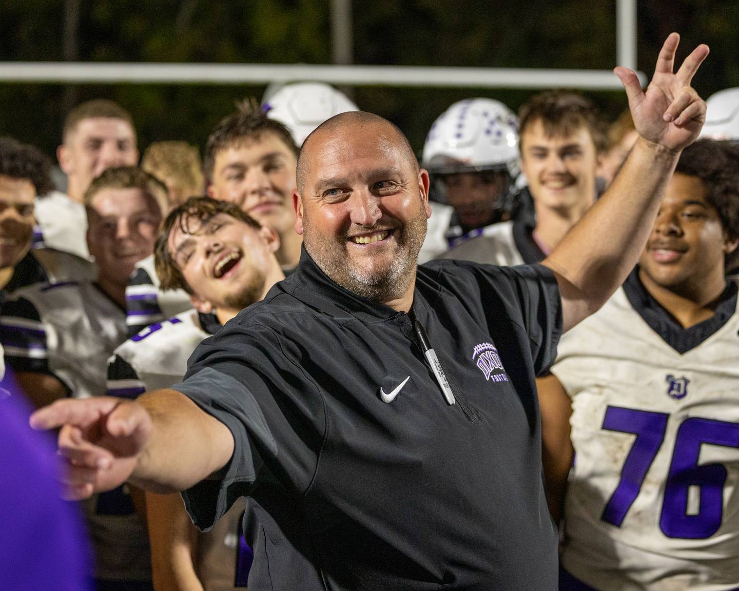 Dixon head coach Jared Shaner celebrates with his team after a win at Streator on Friday, Oct. 17, 2025.