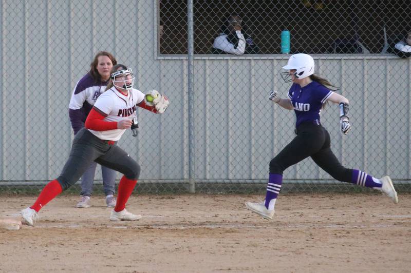 Ottawa's McKenzie Oslanzi makes a catch at first base to force out Plano's Lainey Lemke on Thursday, April 6, 2023 at King Field in Ottawa.