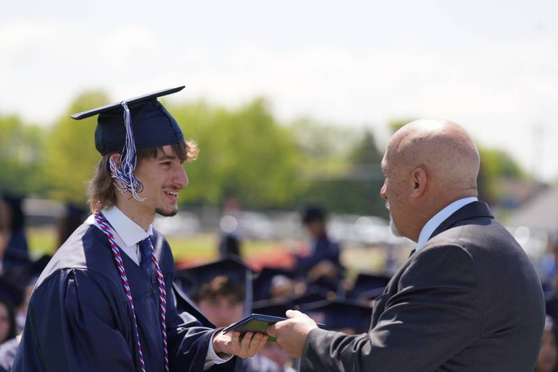 Members of the Cary-Grove High School class of 2026 celebrate their commencement on May 16, 2026.