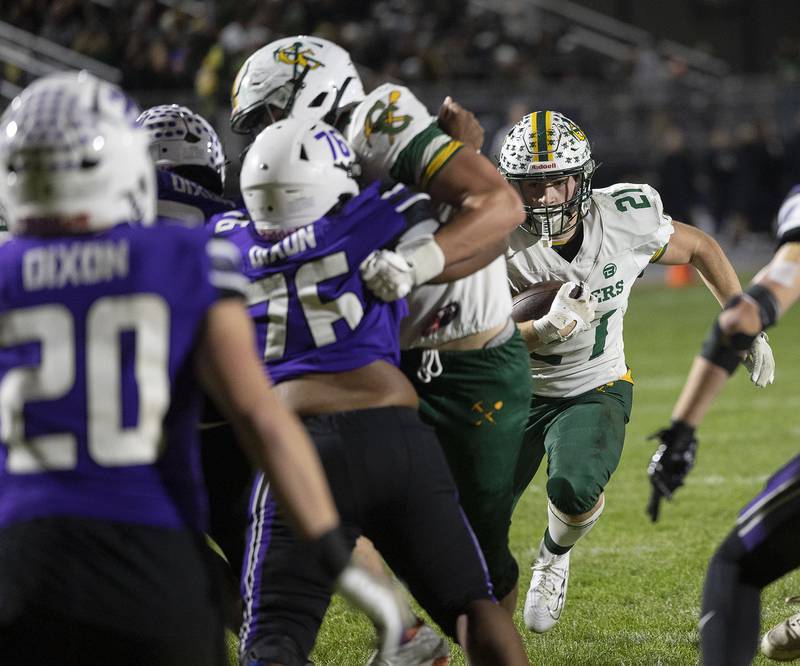 Coal City’s Logan Natyshok eyes the end zone against Dixon Friday, Nov. 7, 2025.