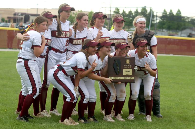 Richmond-Burton celebrates a win over Stillman Valley in softball sectional title game action in Richmond Friday evening.