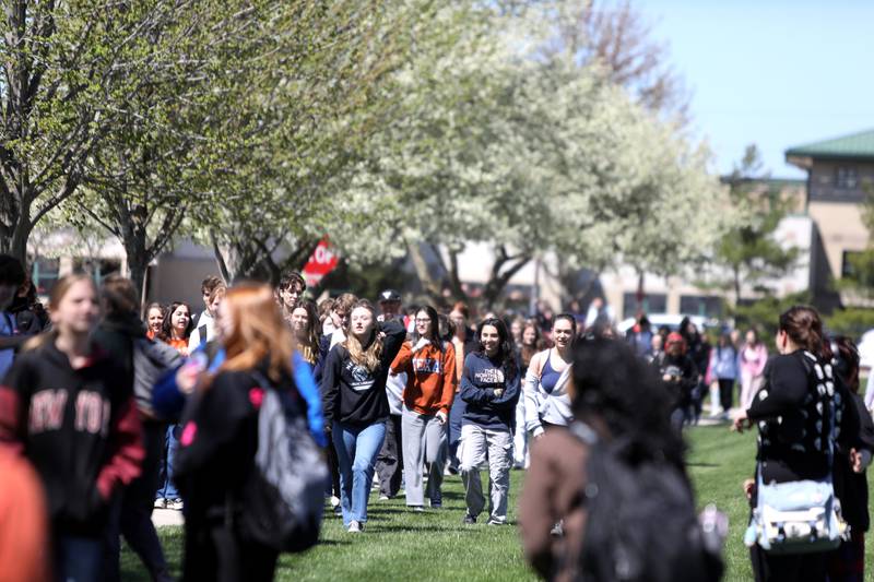 Hundreds of Batavia High School students walked out of school for a peaceful protest organized by the school’s Students Against Gun Violence club on Friday, April 19, 2024.