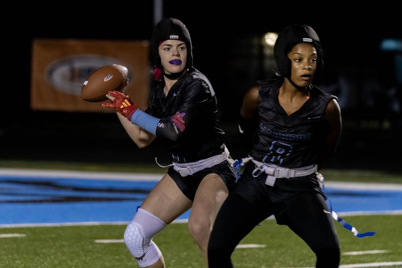 Willowbrooks's Marli Smrz looks for an open teammate during a varsity flag football IHSA State Quarterfinals game against Kenwood, held at Willowbrook High School on Oct. 17, 2025.