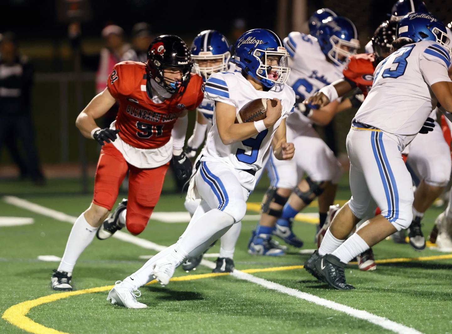 Riverside Brookfield's Braeden Novak (9) scrambles during the varsity football game between Riverside Brookfield and Glenbard East on Friday, Oct. 24, 2025 in Lombard, IL.