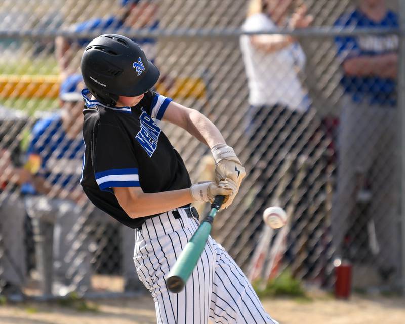 Newark's David Ulrich (19) makes contact with the ball during the game on Tuesday May 13, 2025, while traveling to take on Somonauk High School.
