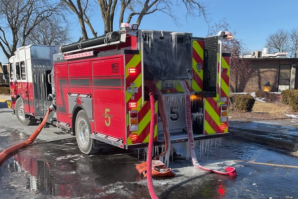 Firefighters battle blaze at Joliet school during freezing weather