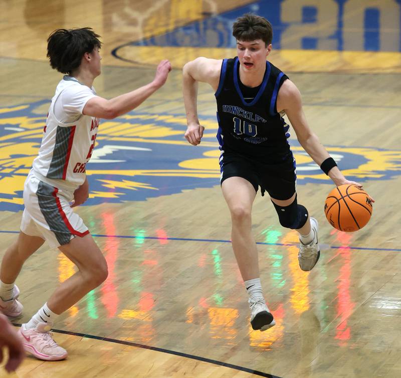 Hinckley-Big Rock's Max Hintzsche works against Aurora Christian's Jacob Baumann during their sectional final game Friday, March 7, 2025, at Somonauk High School.