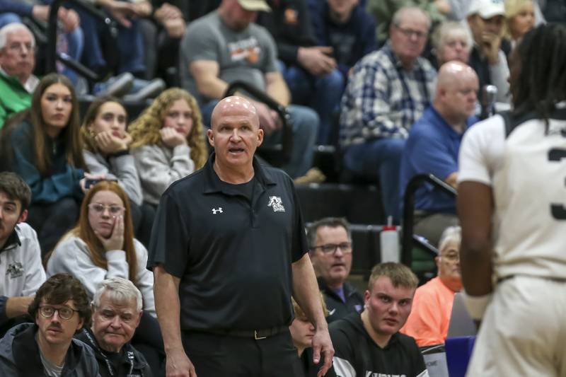 Kaneland's head coach Ernie Colombe watches his team during their Plano Christmas Classic semi-final basketball game between Kaneland at LaSalle Peru Monday, Dec 29, 2025 in Plano.