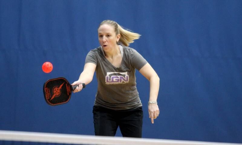 Katie Hernacki of South Elgin returns the ball during a pickle ball open gym session at the Stephen D. Persinger Recreation Center in Geneva on Jan. 12, 2023.