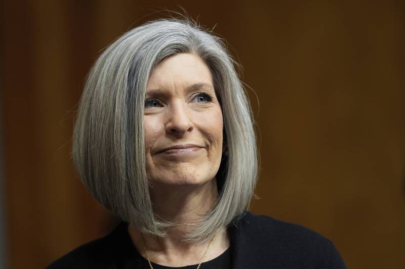 Sen. Joni Ernst, R-Iowa, listens at the Senate Homeland Security and Governmental Affairs Committee confirmation hearing for South Dakota Gov. Kristi Noem, President-elect Donald Trump's nominee to be Secretary of Homeland Security, at the Capitol in Washington, Friday, Jan. 17, 2025. (AP Photo/Susan Walsh)