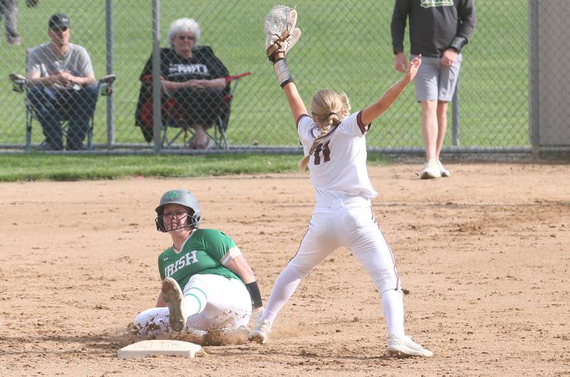 Seneca's Brynlee Hunt steals second base as Ottawa's Rylee Harsted catches the ball at the bag on Friday, May 2, 2025 at Ottawa High School.