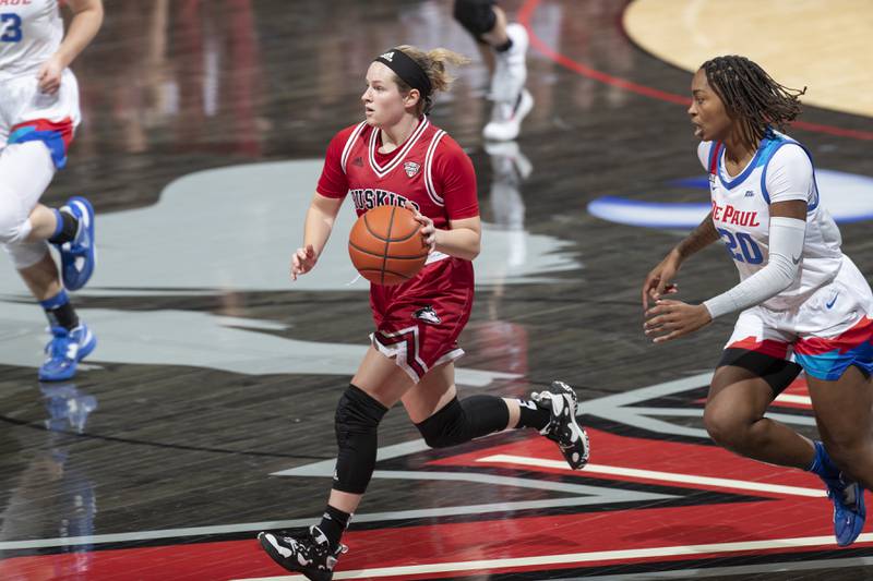 Chelby Koker works the ball upcourt during NIU's 86-79 win over DePaul on Saturday, November 12, 2022. It was the Huskies' first win against the Blue Demons since 1994.