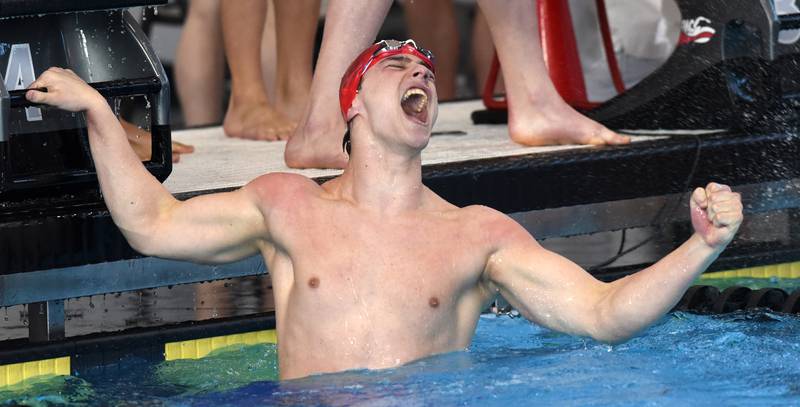 Hinsdale Central anchor Brody Marcet celebrates his team’s state-record finish in the 200-yard medley relay during the boys state swimming and diving finals at FMC Natatorium on Saturday, Feb. 24, 2024 in Westmont.