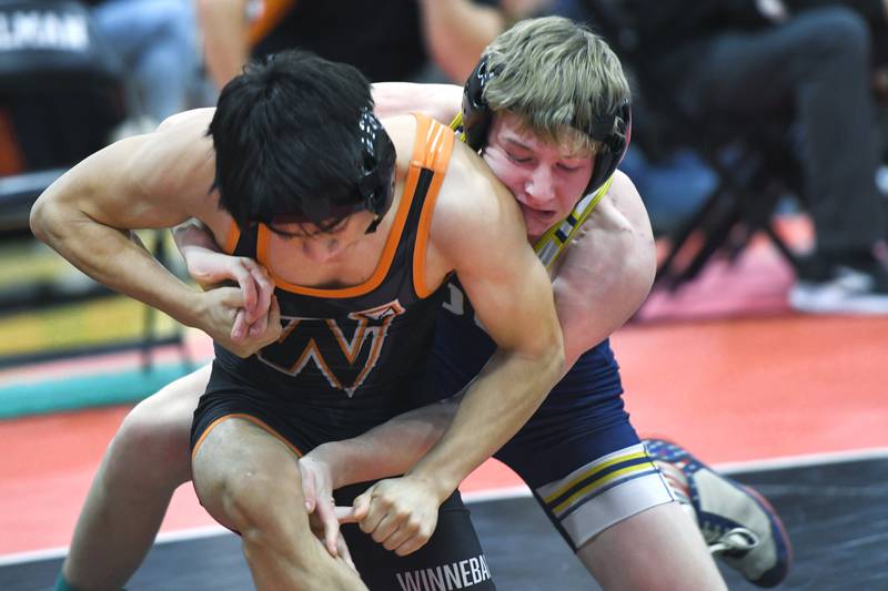 Polo's Ryder Faivre locks up Winnebago's Agustin Gonzalez in their 138-pound consolation final match at the 1A Stillman Valley Sectional on Saturday, Jan. 31, 2026 at Stillman Valley High School.