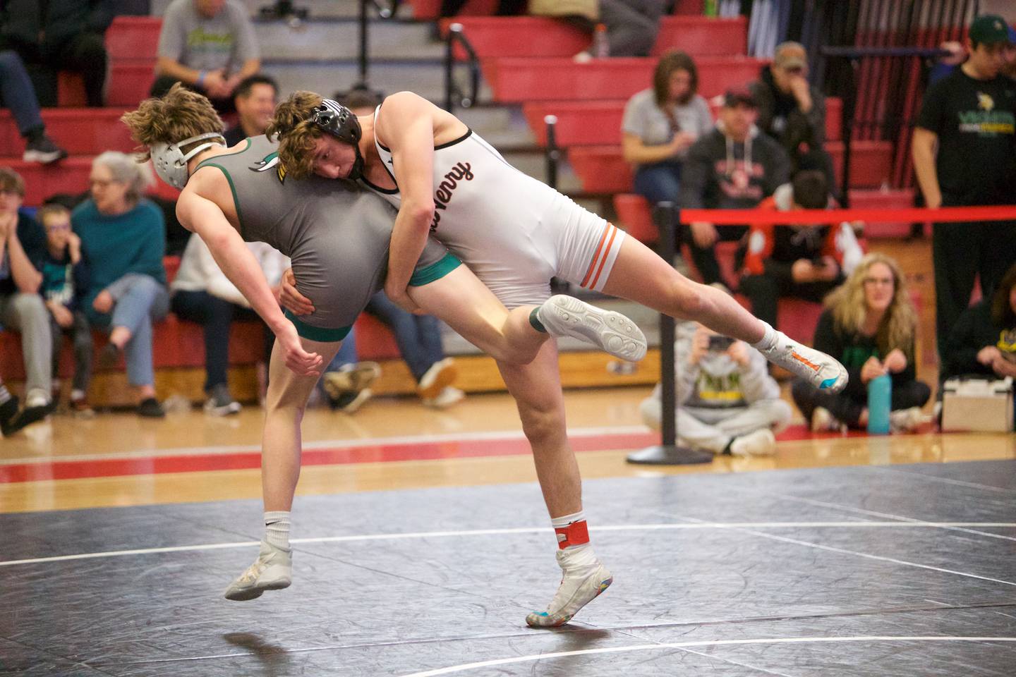 McHenry's Pedro Jimenez completes against Fremd's Jake Crandall in the 145 lb 3rd place match at the Class 3A Sectional at Barrington High School on Saturday, Feb. 11, 2023.