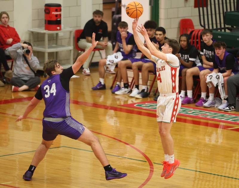 L-P's John Sowers shoots a three point shot over Dixon's Jakob Nicklaus on Tuesday, Jan. 20, 2026 in Sellett Gymnasium at L-P High School.