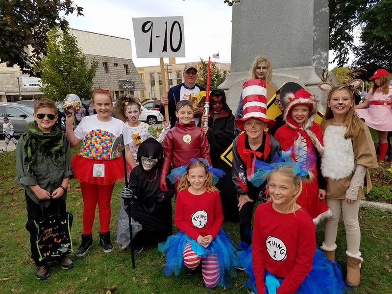 Nine and 10-year-olds pose for a photo after the contest is finished.