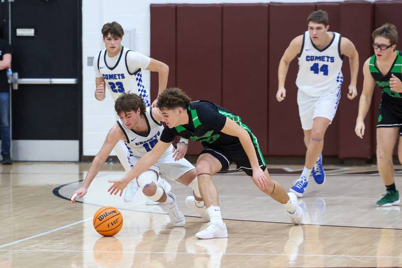 Clifton Central's Blake Chandler and Bishop McNamara's Karter Krutsinger chase a loose ball during the Fightin' Irish's 62-41 victory in the Watseka Holiday Tournament championship on Tuesday, Dec. 16, 2025.