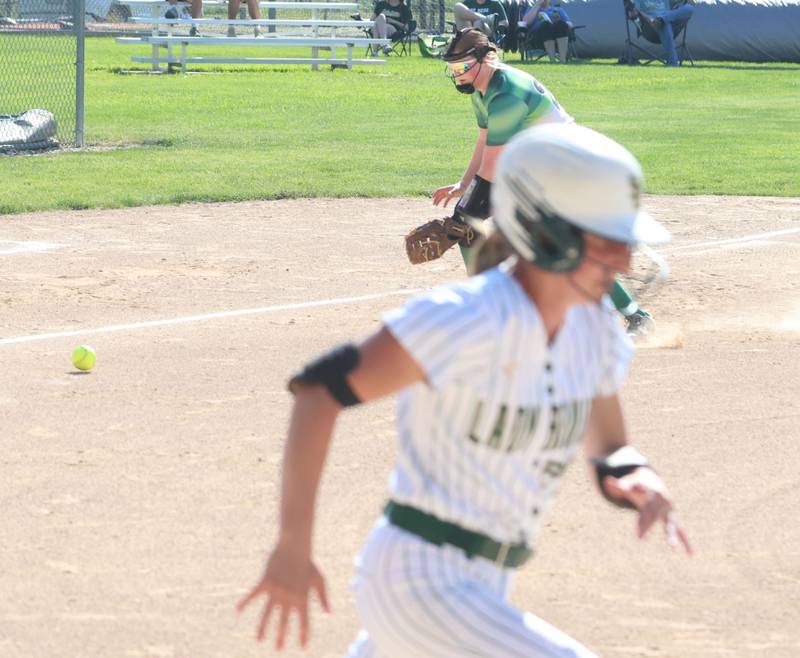 Dwight's Elizabeth Hansen fields a ground ball as St. Bede's Emma Slingsby runs safely to first base on Friday, May 15, 2026 at St. Bede Academy.
