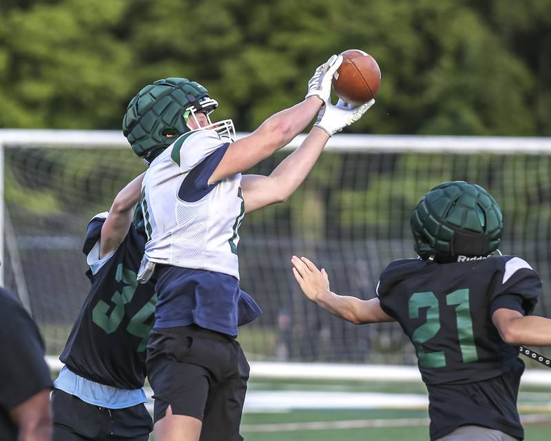 Chase Cavan makes a catch at Glenbard West football practice, Wednesday, Aug 21, 2025  in Glen Ellyn.