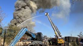 Joliet firefighters battle fire at scrap metal recycling yard 