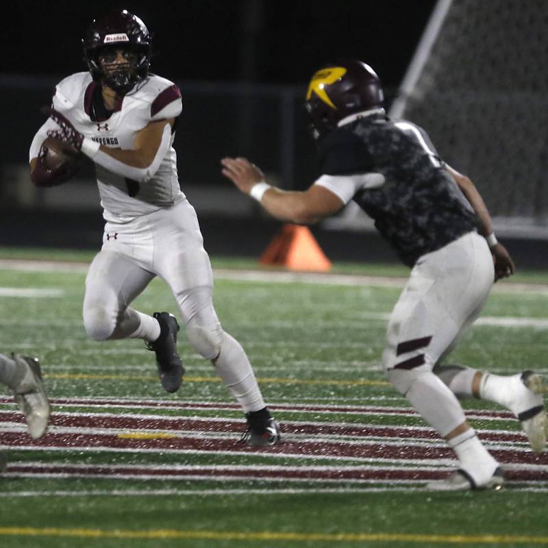 Marengo's Gavin Baros is pursued by Richmond-Burton's Blake Livdahl during a Kishwaukee River Conference football game on Friday, Oct. 17, 2025, at Richmond-Burton High School in Richmond.