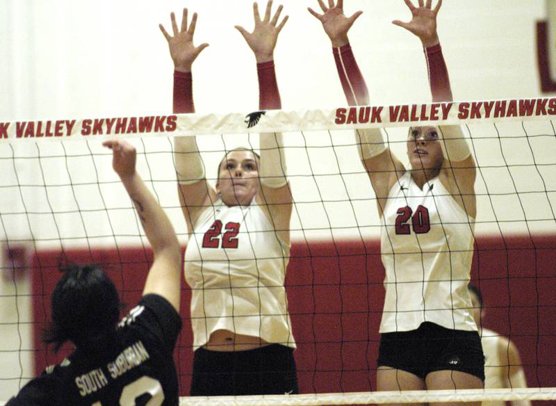Skyhawks  ReAnna Brant and Lacey Eissens block a shot. Sauk Valley College beat South Suburban College in three sets Wednesday, November 6, 2024 at Sauk Valley Community College. SVCC entered postseason as top seed in Region 4.