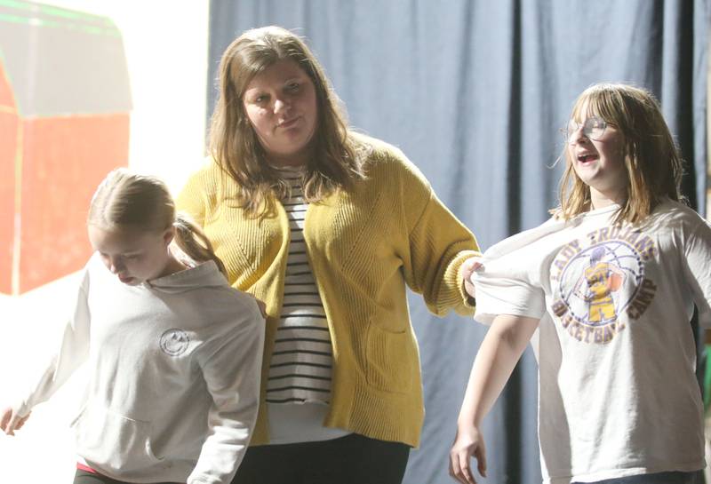Martha, played by Piper Forrest. Viney, played by Lisa Gifford and Mary, played by Emilia Farrier rehearse a scene during "The Miracle Worker" on Thursday, March 21, 2025 at Stage 212 in La Salle.