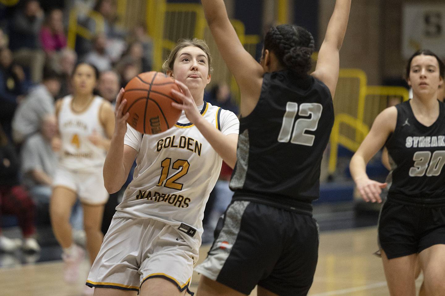 Sterling’s Olivia Melcher drives for the hoop against Galesburg on Wednesday, Feb. 8, 2023.