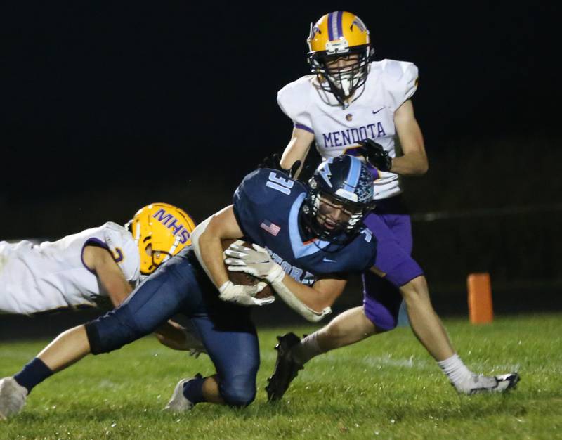 Mendota's Keegan Beetz makes.a catch down the field over Bureau Valley's Brooi Shane on Friday, Sept. 22, 2023 at Bureau Valley High School.