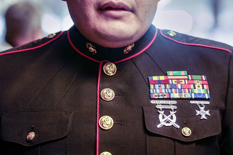 U.S. Marine Corps Staff Sgt. Chirs Perez before a program honoring veterans at Northwood Middle School in Woodstock, Ill. on Thursday, Nov. 7, 2013. Lathan Goumas - lgoumas@shawmedia.com