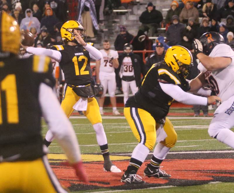St. Laurence quarterback Evan Les throws a pass against Rochester during the Class 4A State football championship on Friday, Nov, 24, 2023 at Hancock Stadium in Normal.