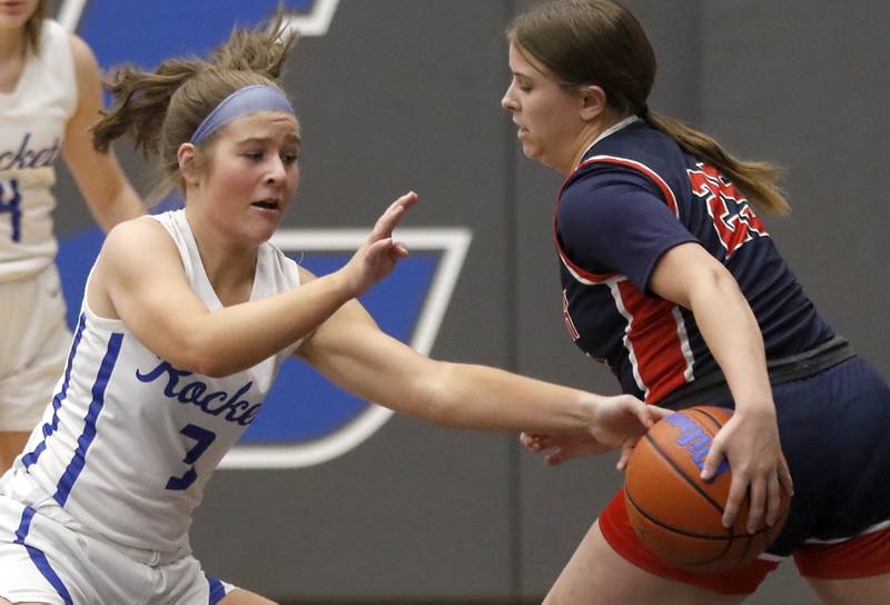 Burlington Central's Savannah Scheuer steals the ball from Belvidere North's Alexa Nogard on Monday, Nov. 13, 2023, during pool play girls basketball game in the Burlington Central Mark Einwich Tournament.