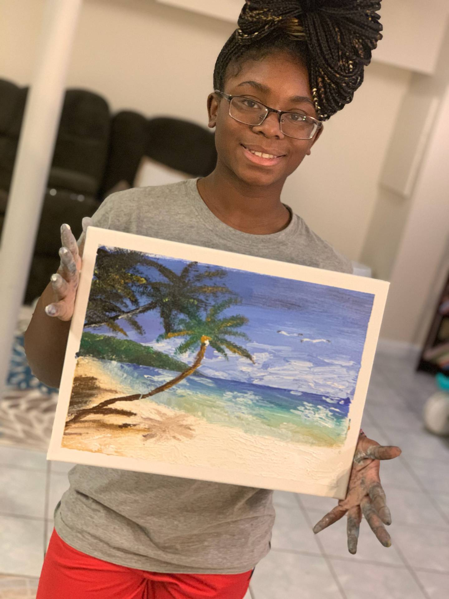 Dykota Morgan, 15, of Bolingbrook was an athlete, artist, activist and scholar. She died of complications from COVID-19. Dykota is holding the first picture she ever painted.