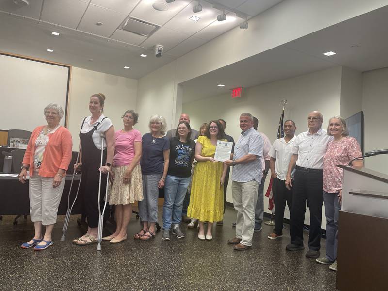 DeKalb city leaders take time to recognize a proclamation Aug. 26, 2024, during the DeKalb City Council meeting celebrating the 150th Anniversary of Joseph F. Glidden’s “The Winner” Barbed Wire Patent.