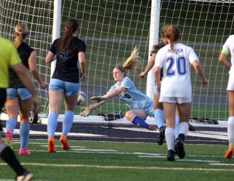 Geneva goalkeeper Jordan Forbes gets a save during a Class 3A West Chicago Sectional semifinal against St. Charles North on Tuesday, May 23, 2023.
