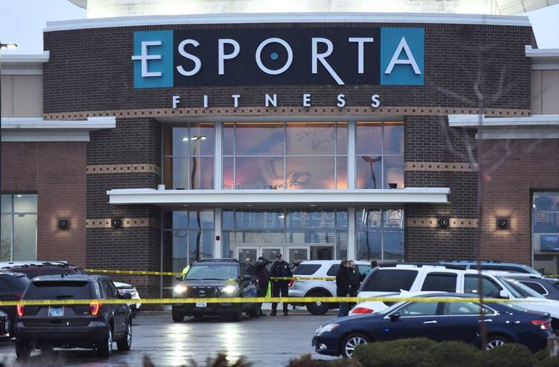 Police investigate a fatal shooting the evening of Wednesday, April 13, 2022, in the parking lot of Esporta Fitness on the 400 block of North 8th Street in West Dundee.