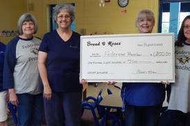DeKalb women’s chorus donates check to Sycamore preschool